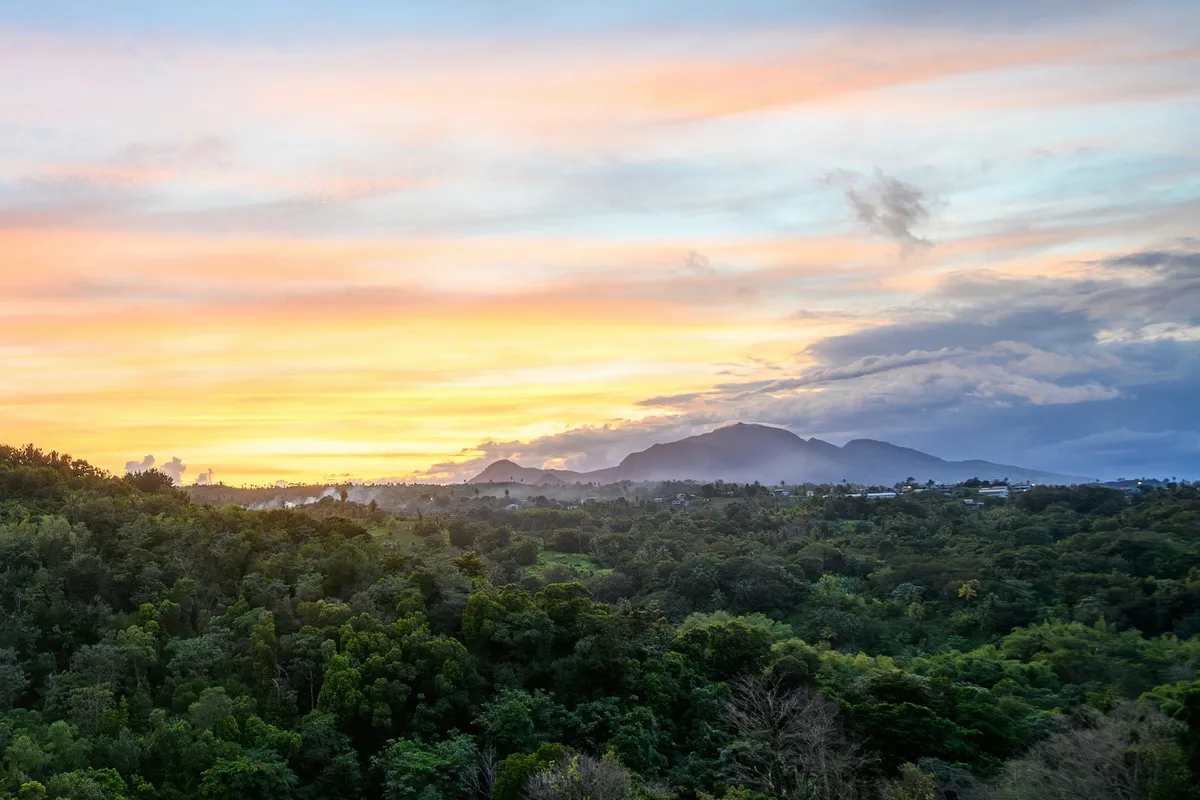 Sunset over rainforest and mountains near Wesley, Dominica